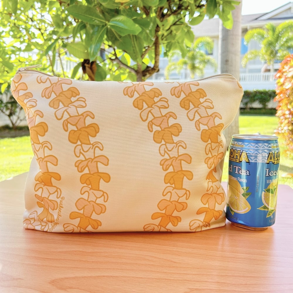 large canvas zippered pouch - beige with pua kenikeni lei from Puakenikeni Designs view with juice can
