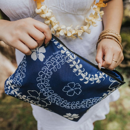 puakenikeni lei canvas zipper pouch with zipper in blue from Puakenikeni Designs close up of front and zipper