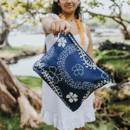 puakenikeni lei canvas zipper pouch with zipper in blue from Puakenikeni Designs front view