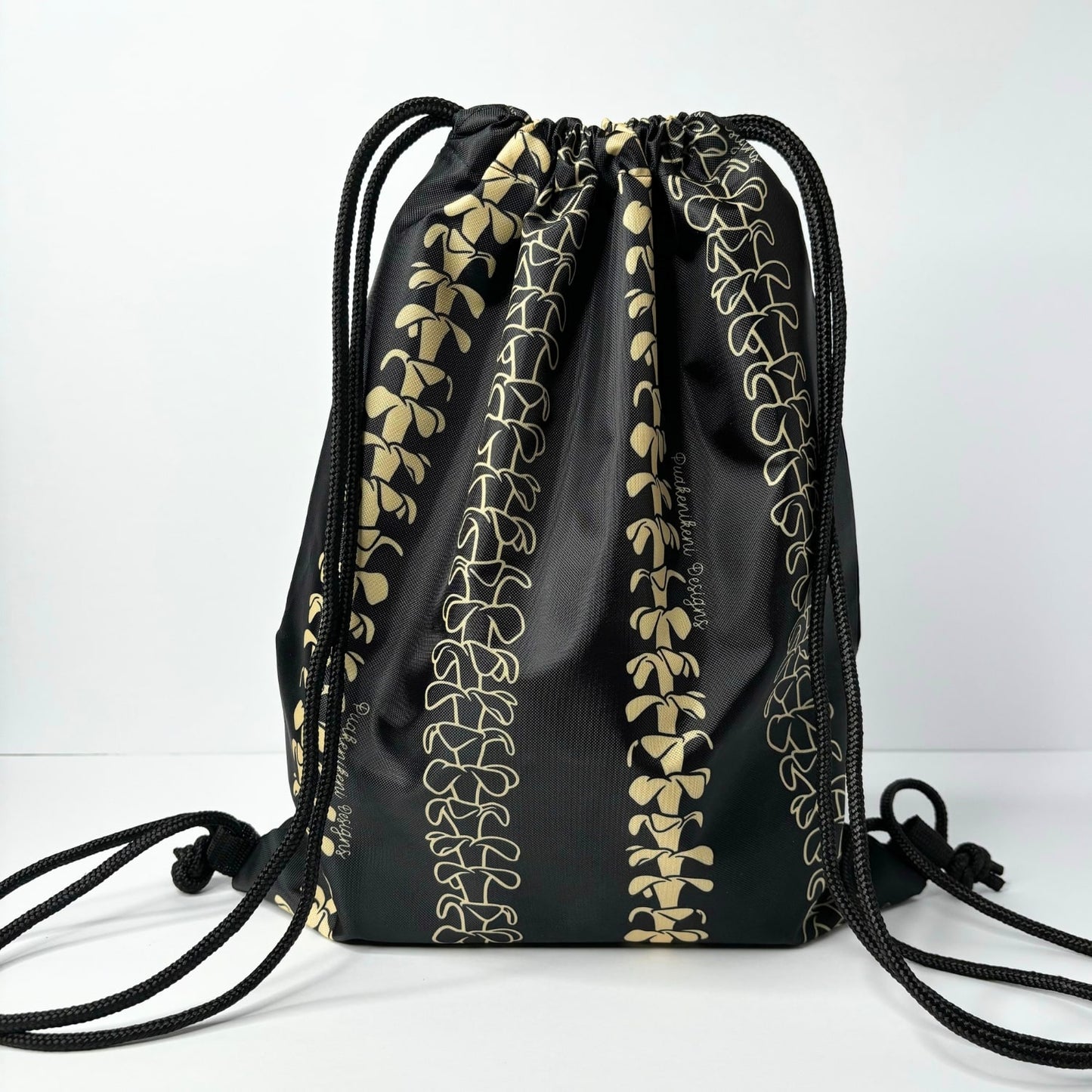 cinch drawstring backpack with pua kenikeni lei from Puakenikeni Designs Beige Lei back view