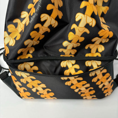 cinch drawstring backpack with pua kenikeni lei from Puakenikeni Designs Kaulua Black close up front zippered pocket view