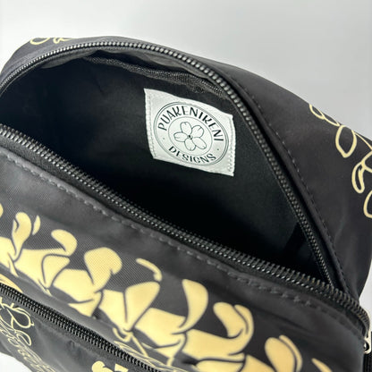 Crossbody bag by Puakenikeni Designs, in black with the best-selling pua kenikeni lei design, Kaulua; for women, moms, teenage girls, for travel and school Beige Lei Design close up of main compartment