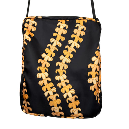 Crossbody bag by Puakenikeni Designs, in black with the best-selling pua kenikeni lei design, Kaulua; for women, moms, teenage girls, for travel and school, back view