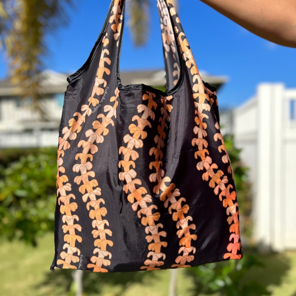 Reusable foldable shopping bag with pua kenikeni lei - black - great for travel - from Puakenikeni Designs