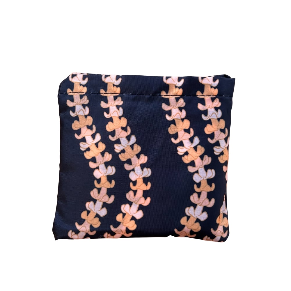 Reusable foldable shopping bag with pua kenikeni lei - black - fold into a pouch - from Puakenikeni Designs