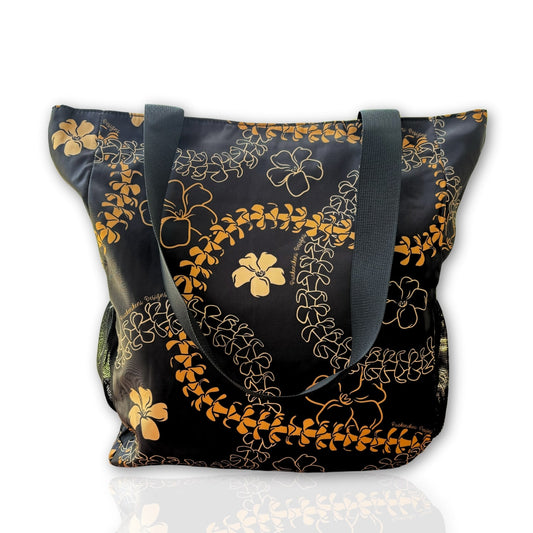 Holoholo bag with orange pua kenikeni lei from Puakenikeni Designs