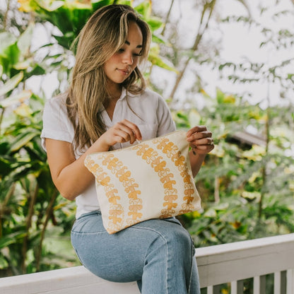 large canvas zippered pouch - beige with pua kenikeni lei from Puakenikeni Designs - model opening