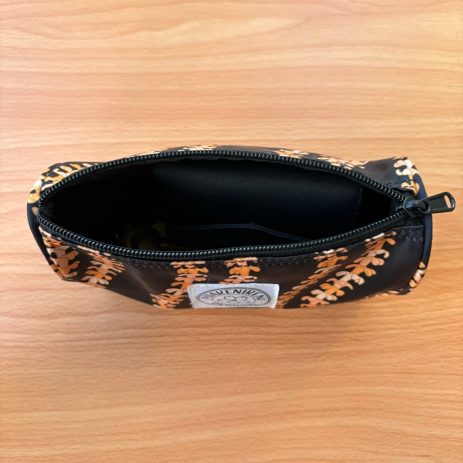 grab and go set includes mini zipper pouch and wristlet key fob in kaulua black orange lei - from Puakenikeni Designs - top view of mini zipper pouch