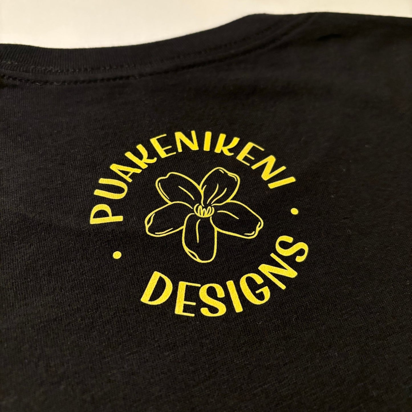 Puakenikeni Lei Black T-Shirt (Unisex) - Various Lei Color