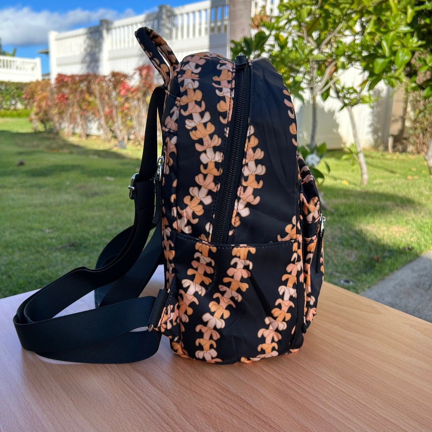 Puakenikeni small backpack purse from Puakenikeni Designs side view