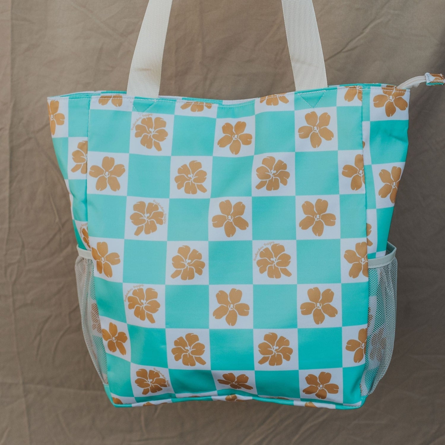 puakenikeni holoholo bag in turquoise checker from Puakenikeni Designs