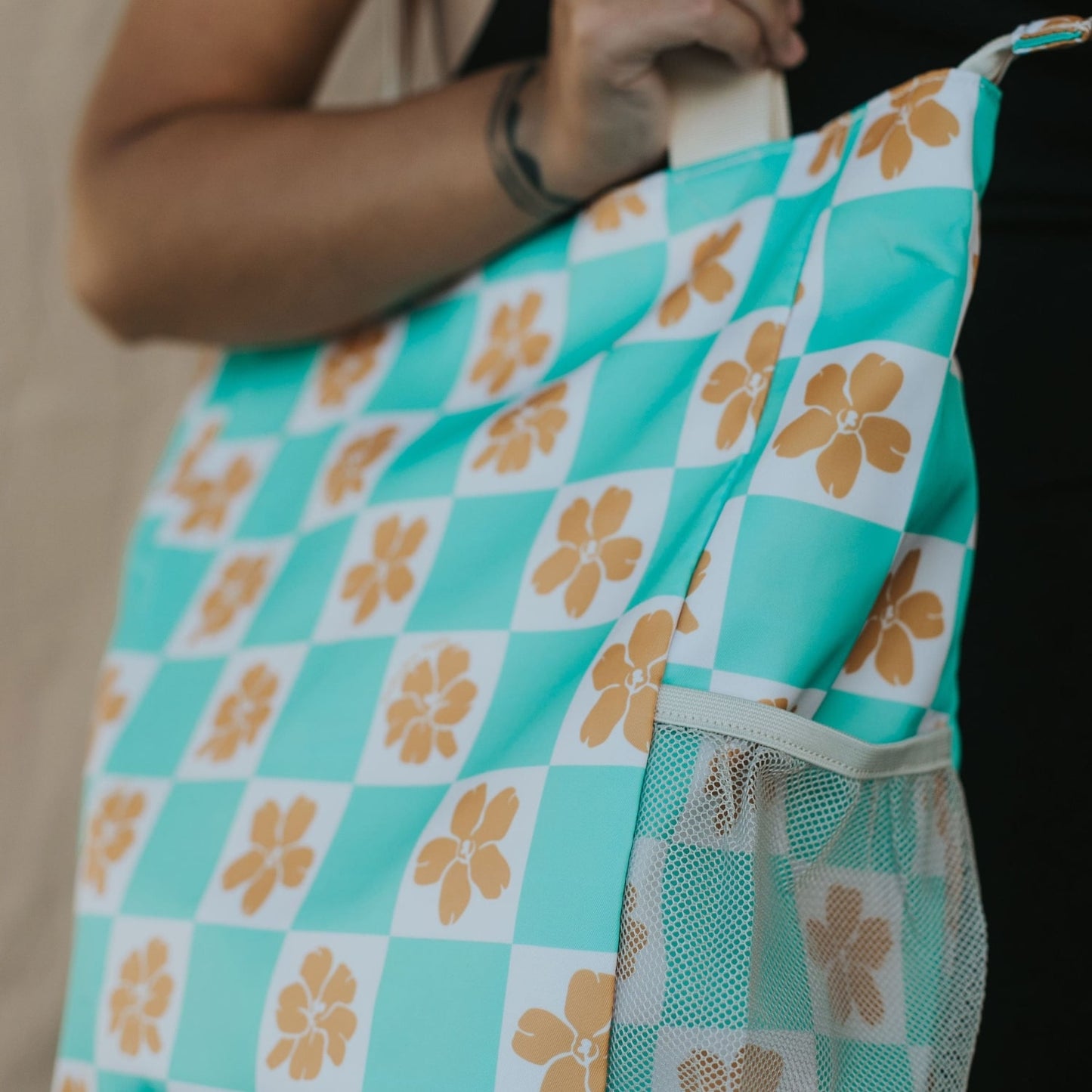 puakenikeni holoholo bag in turquoise checker from Puakenikeni Designs side pocket