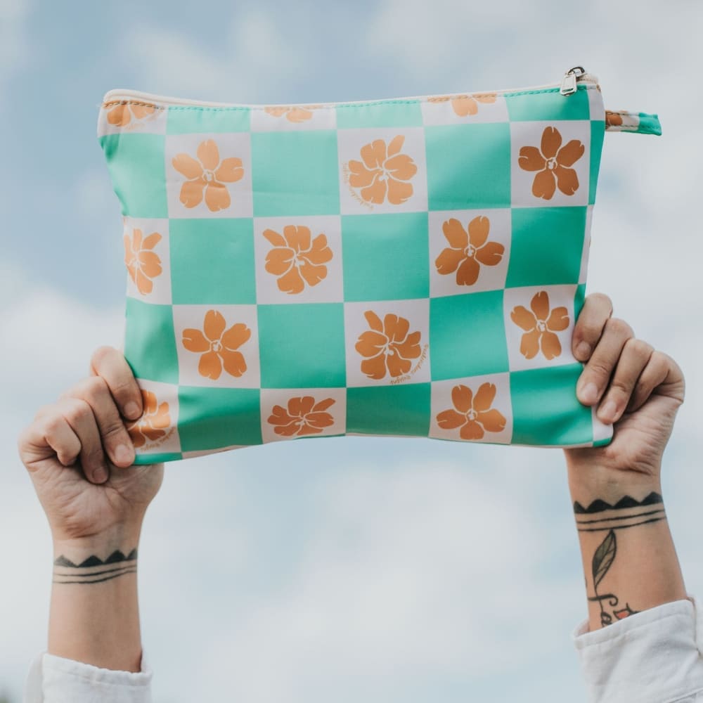 holoholo zipper pouch in turquoise checker from Puakenikeni Designs holding up