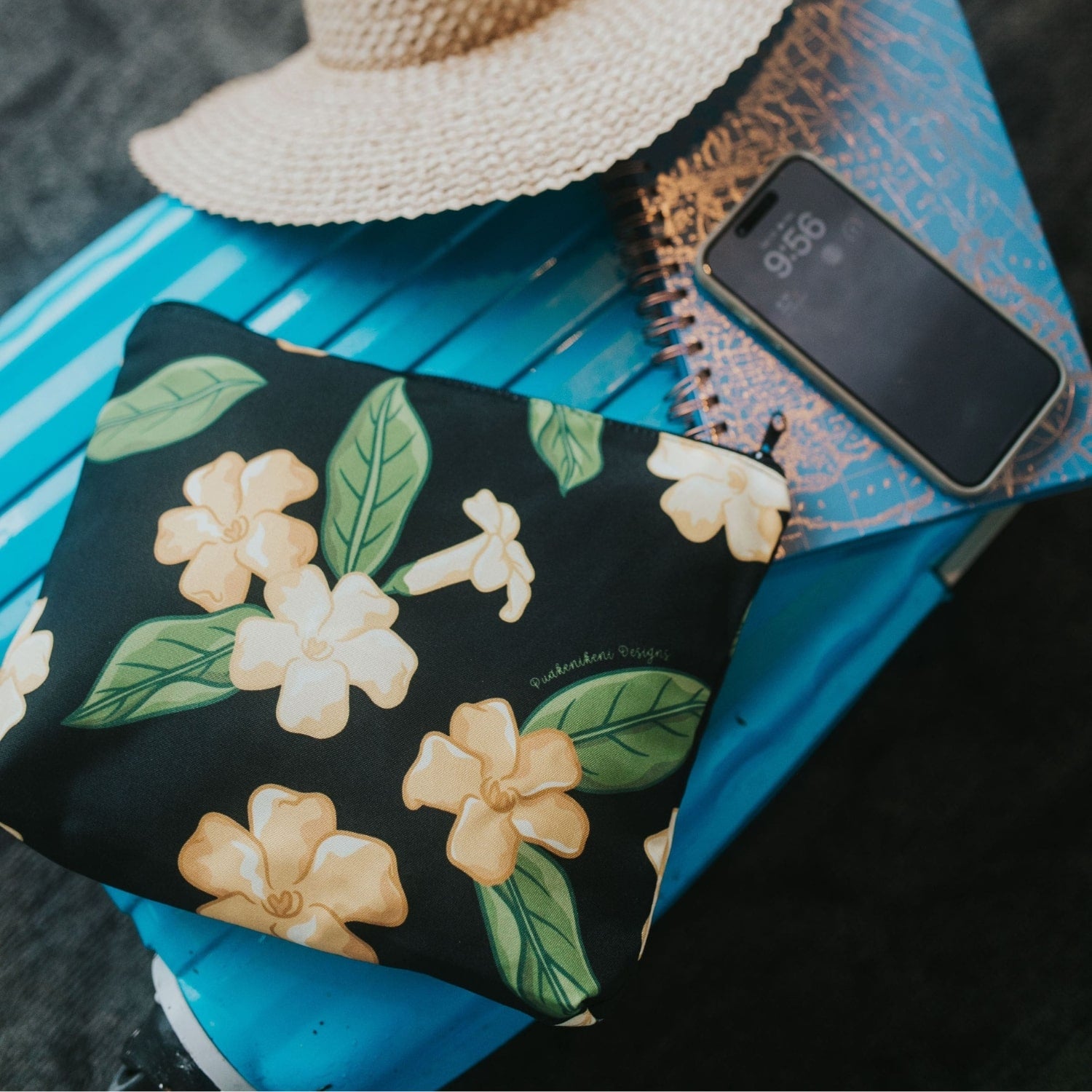 large canvas zipper pouch with pua kenikeni flowers and leaves from Puakenikeni Designs flat lay